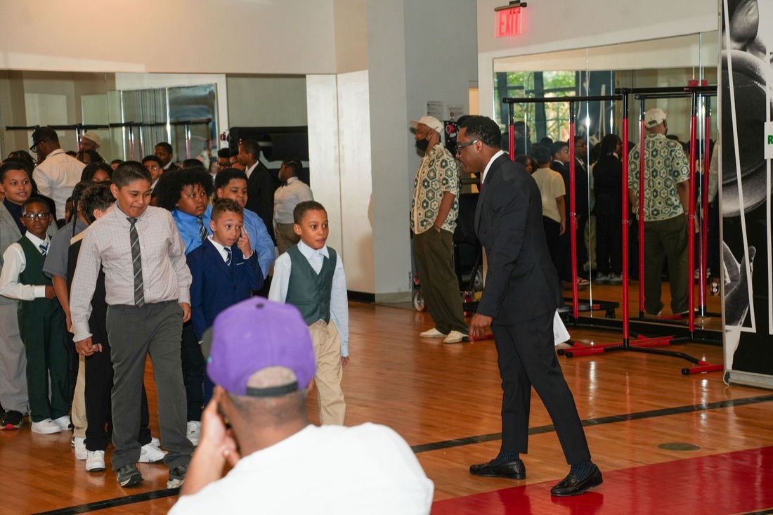 A young man walks the aisle during the induction.