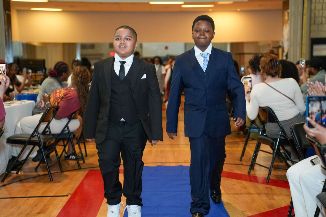 A young man during the induction processional.