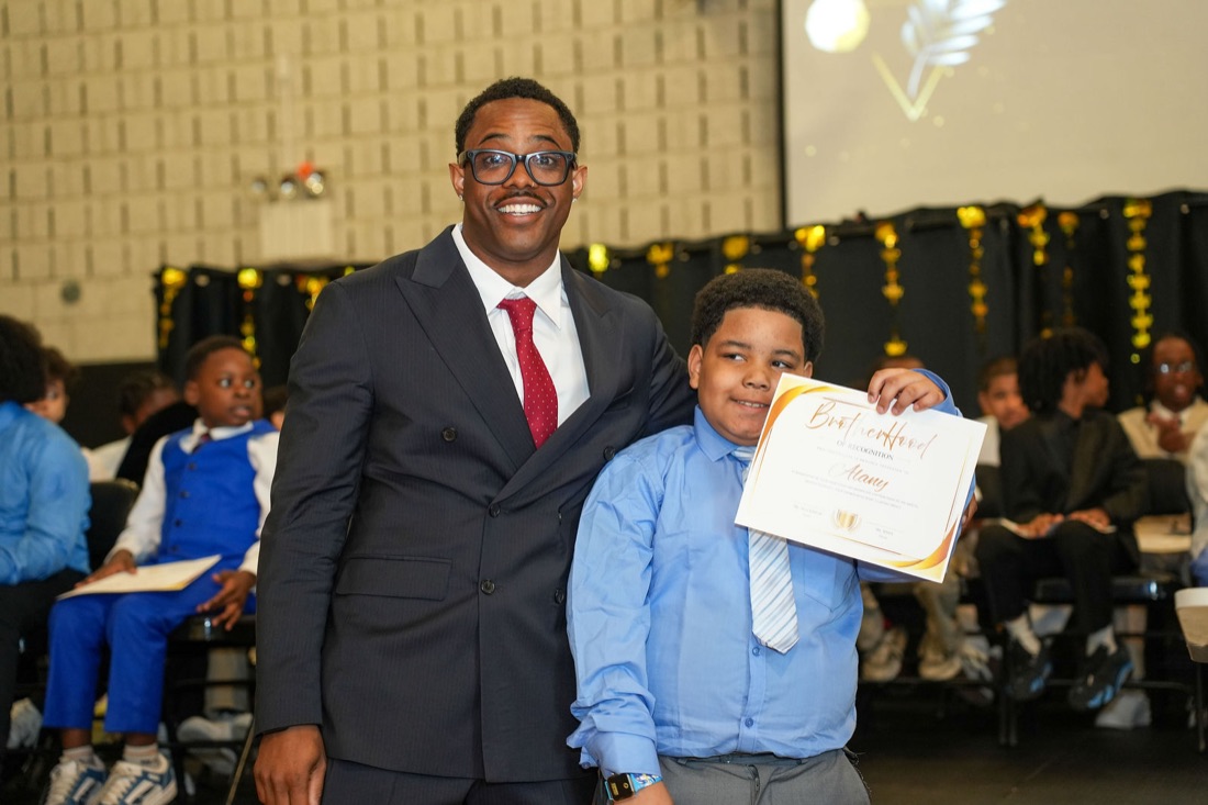 An inductee with his Brotherhood certificate.